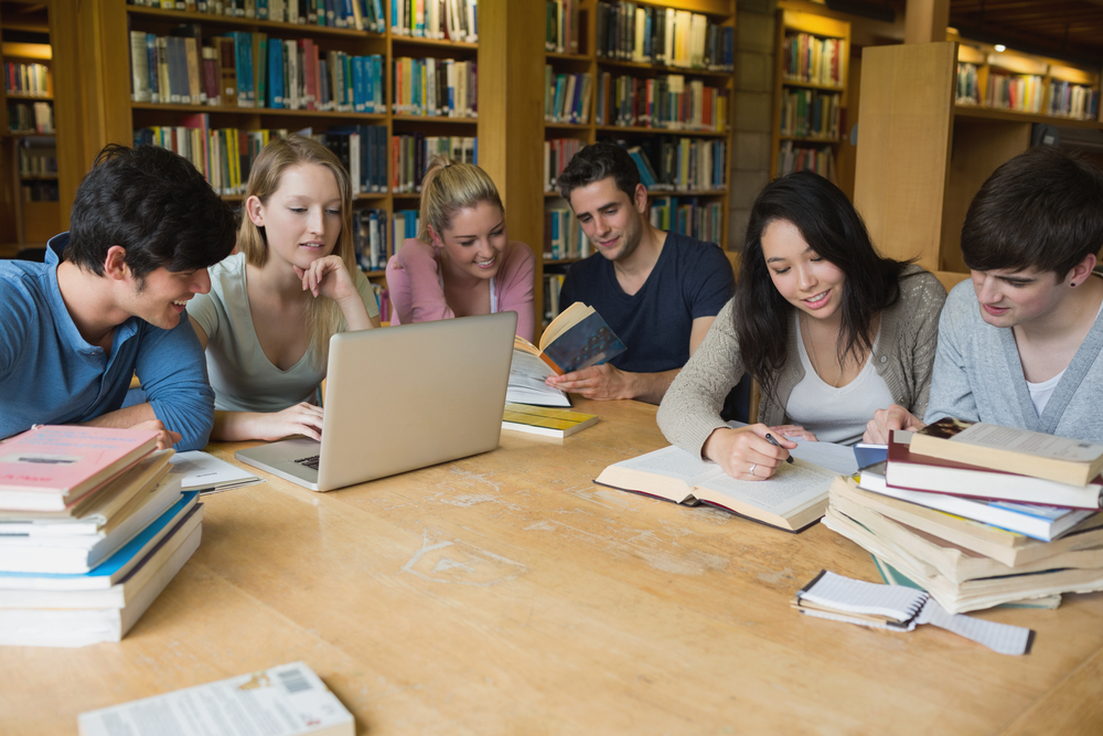 student taking PTE practice test online